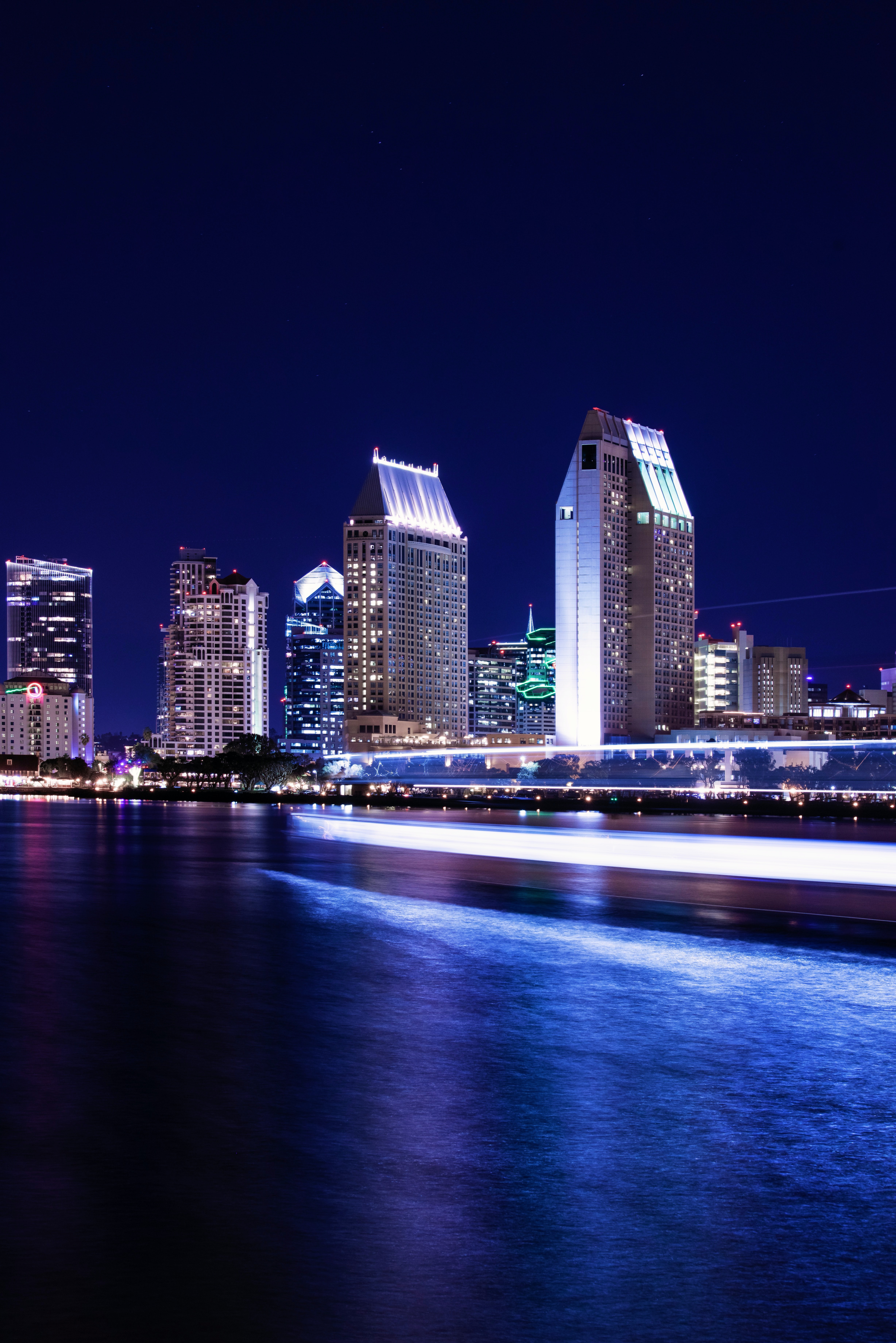 Download mobile wallpaper Cities, Long Exposure, Building, Water, Night City for free.
