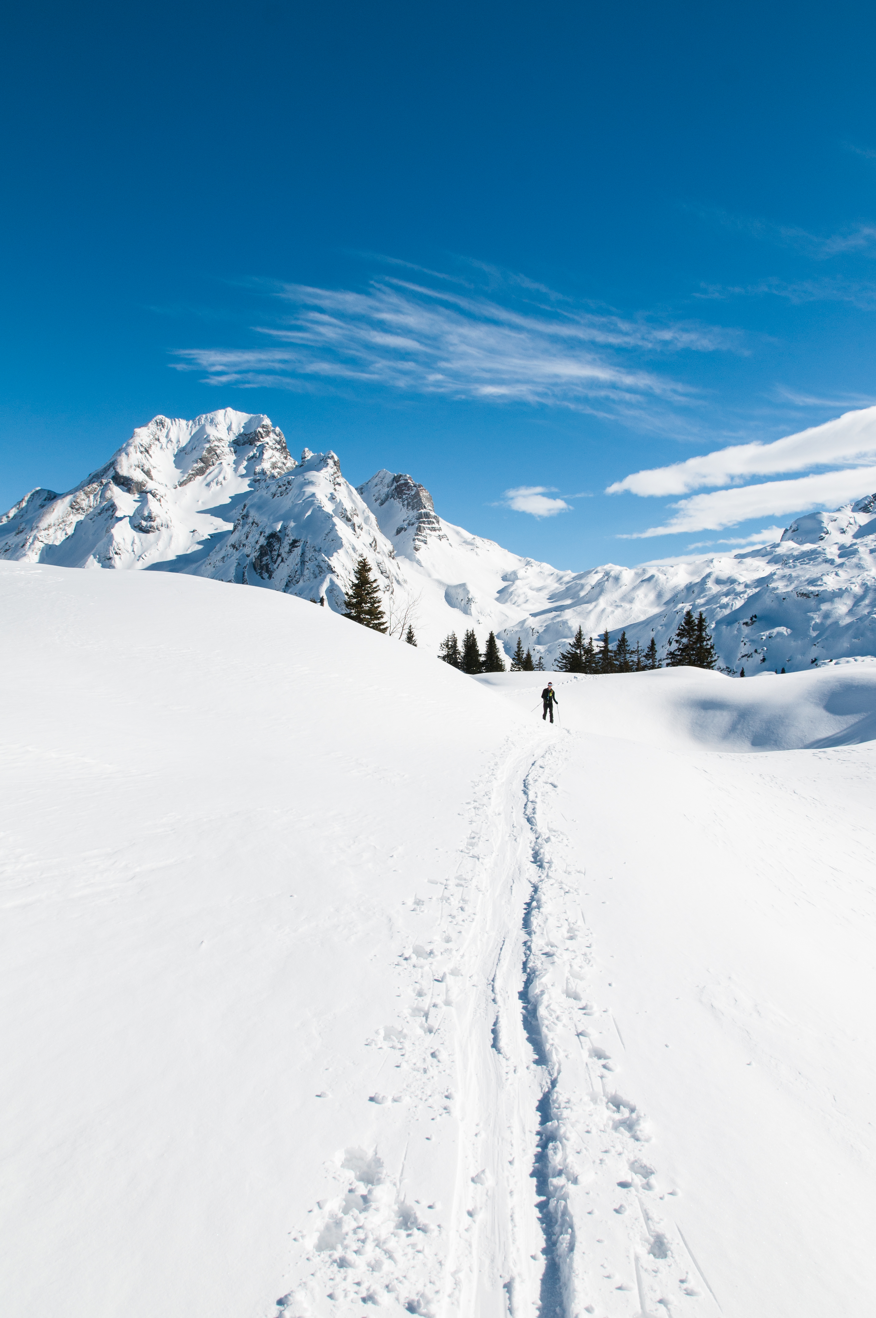 Download mobile wallpaper Skier, Track, Snow Covered, Snow, Snowbound, Mountains, Nature for free.