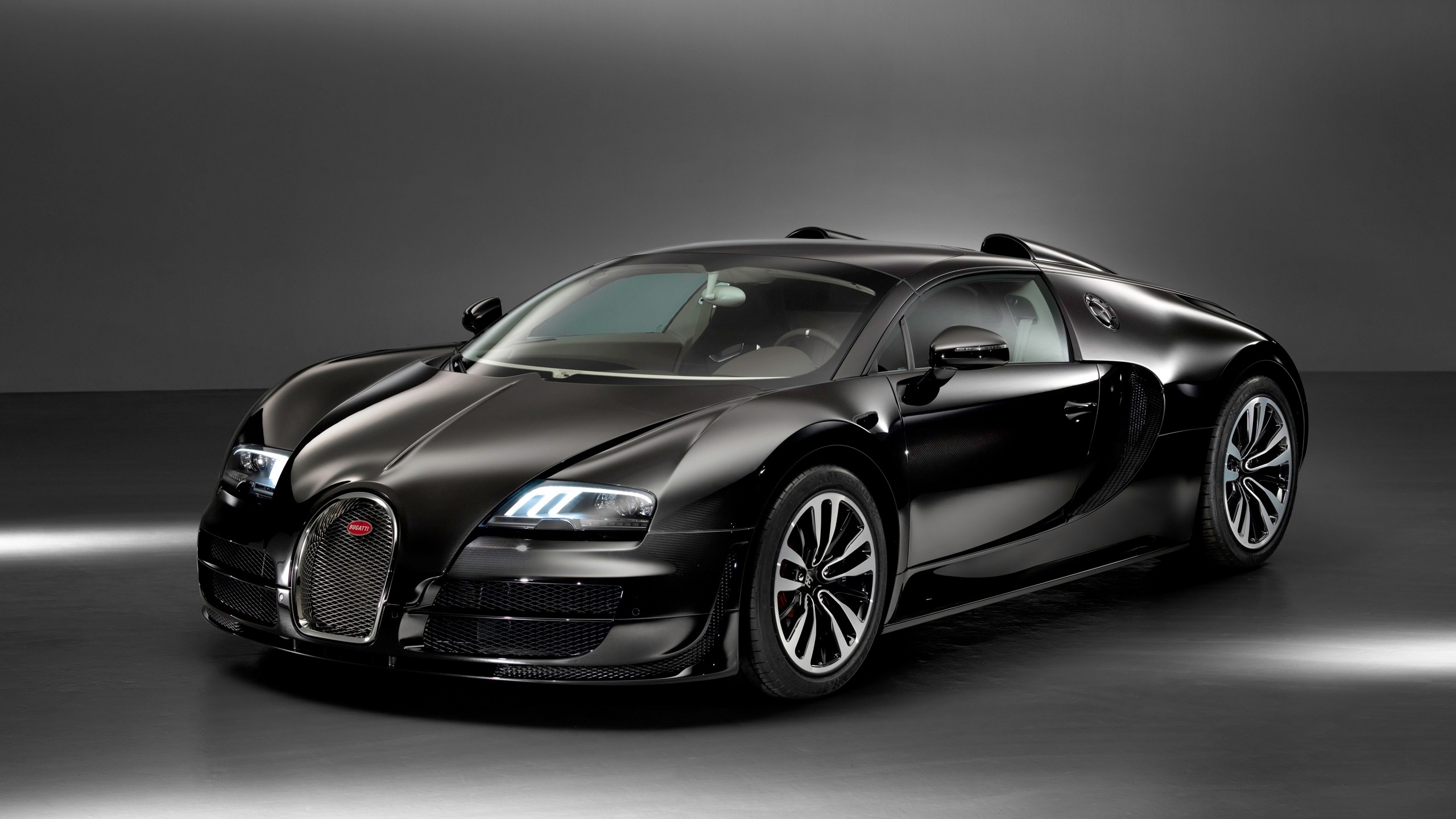 Bugatti black. Бугатти Вейрон. Bugatti Veyron Vitesse. Bugatti Veyron 2013. Бугатти Вейрон черная.