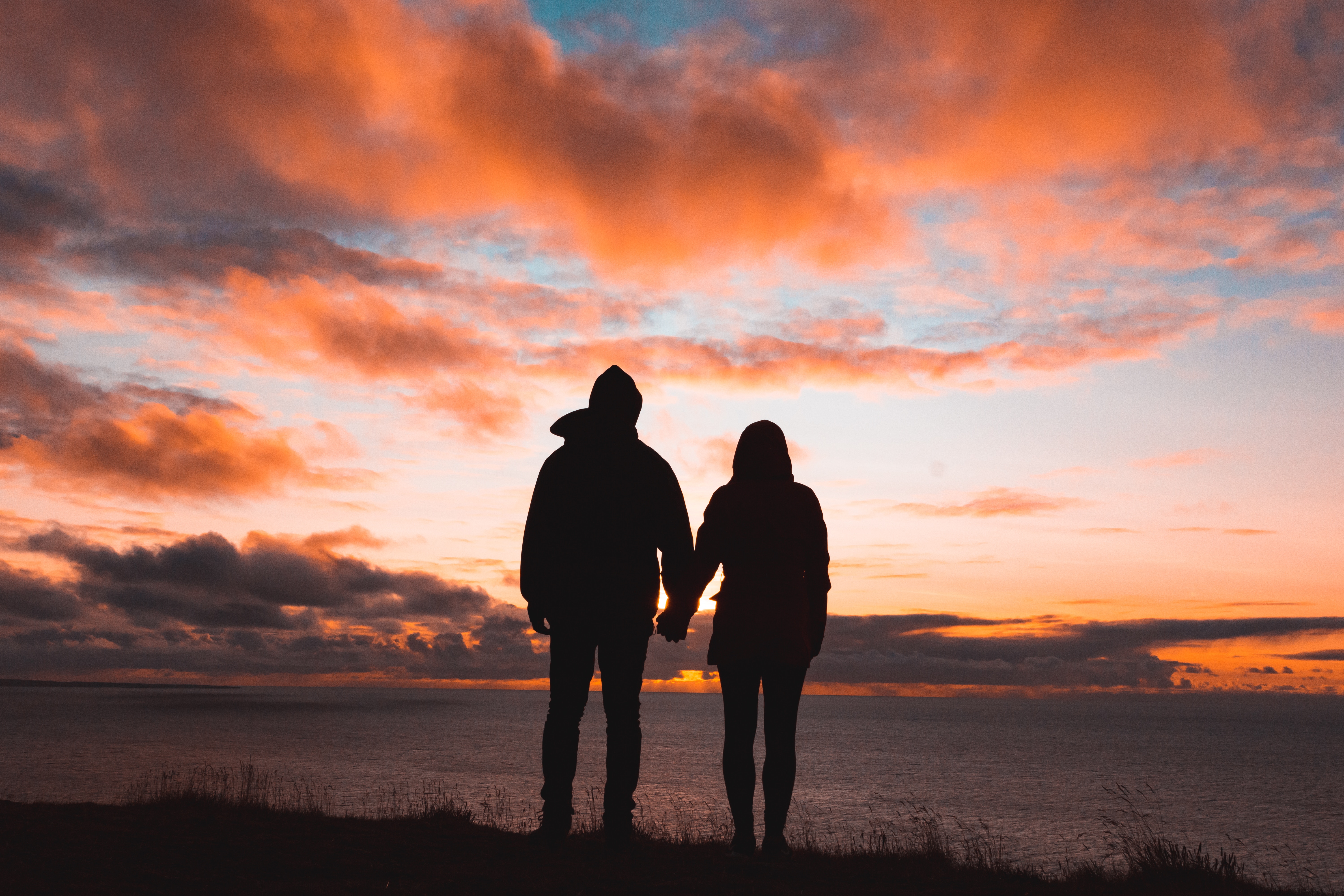 pair, silhouettes, couple, love, sky, sunset wallpaper for mobile