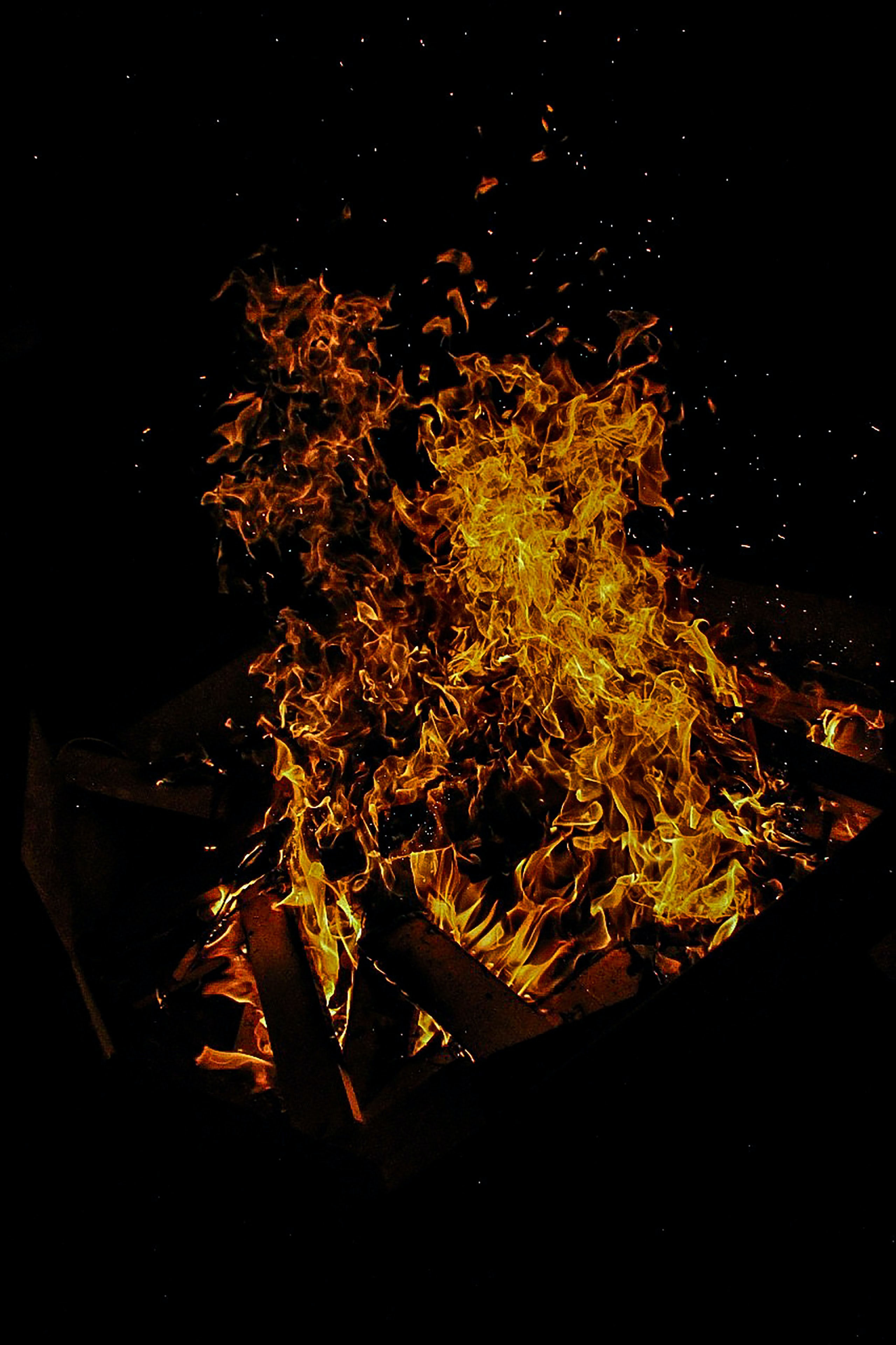 Free download wallpaper Sparks, Flame, Dark, Bonfire on your PC desktop