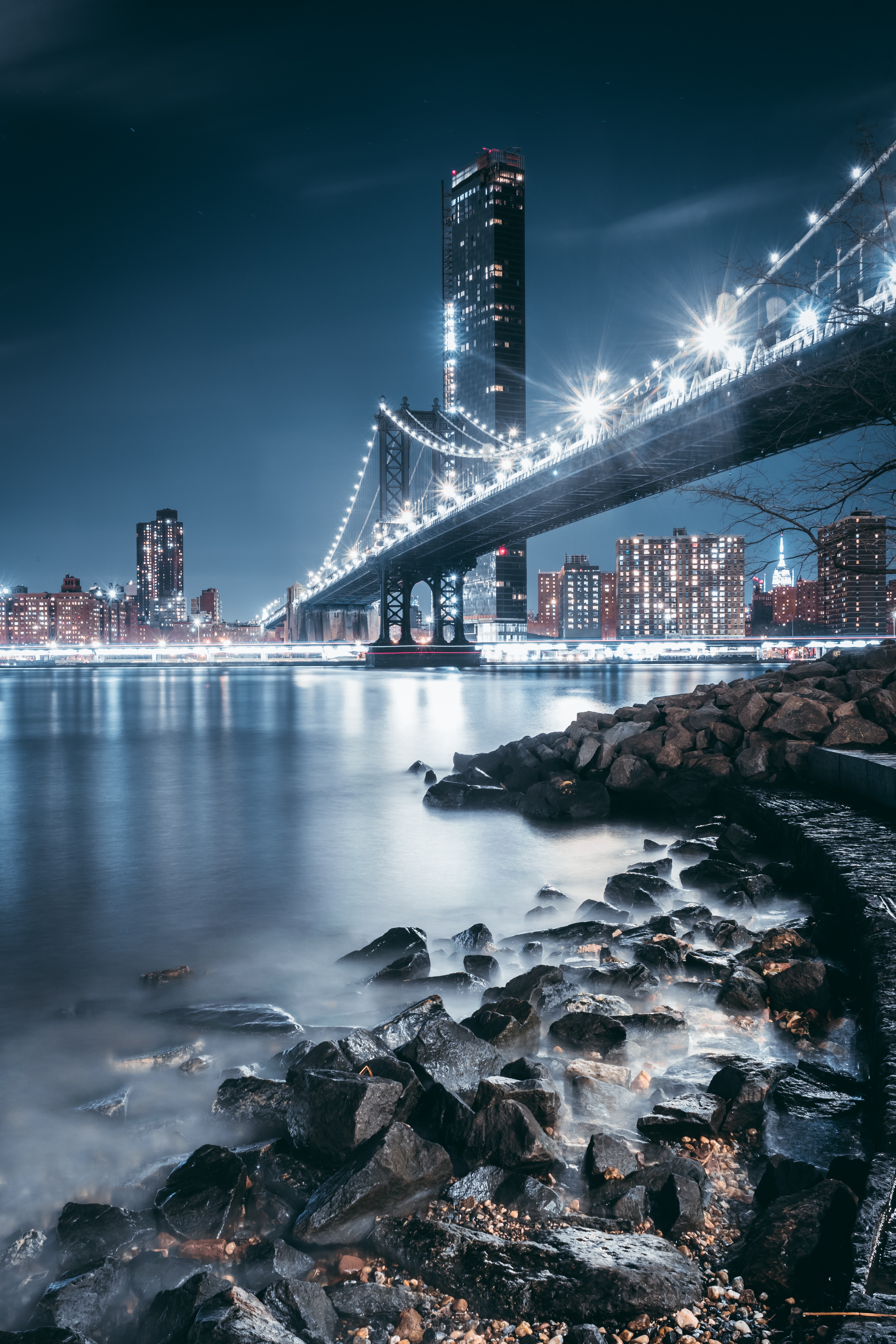 shore, night city, cities, stones, bank, city lights, bridge High Definition image