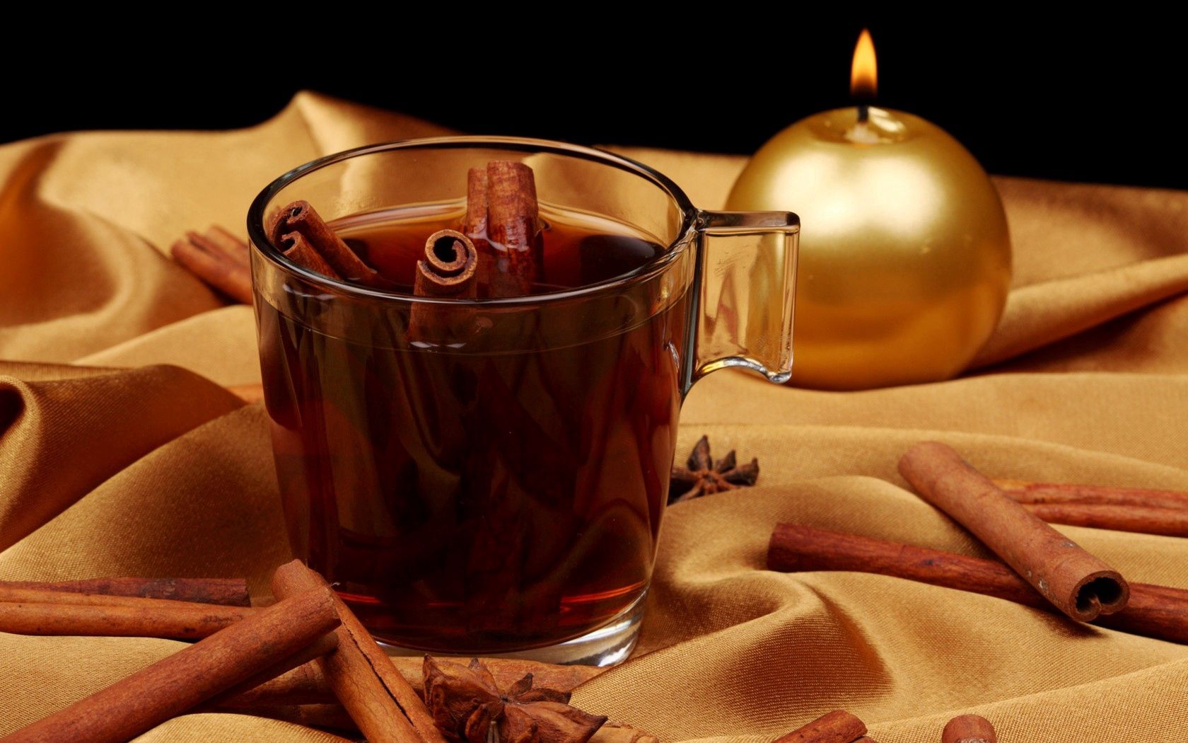 Download mobile wallpaper Cinnamon, Cloth, Cup, Food, Glass, Candle, Tea, Golden, Gold for free.