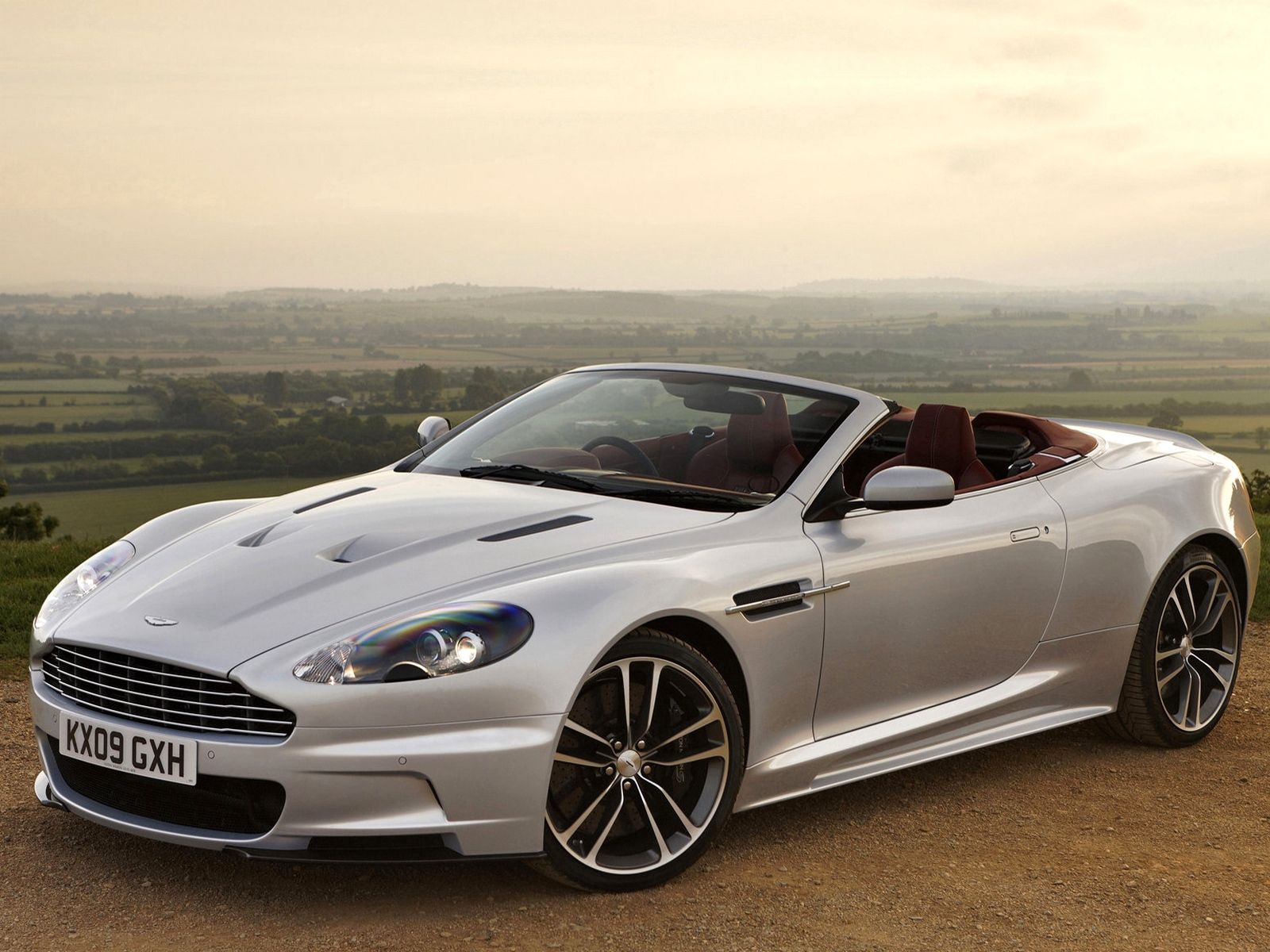 Download mobile wallpaper Dbs, 2009, Cabriolet, Silver Metallic, Aston Martin, Side View, Nature, Cars for free.