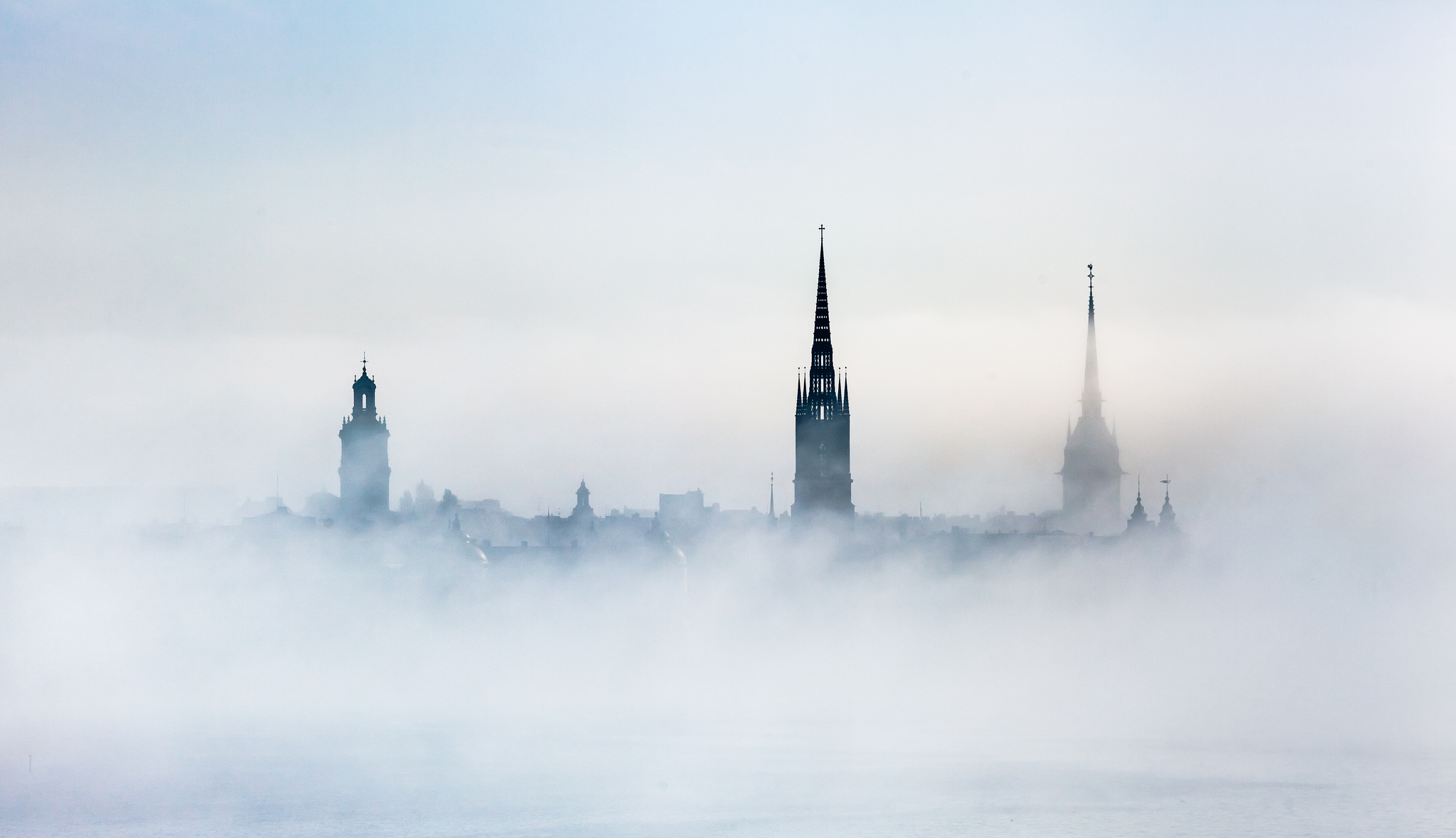 Download mobile wallpaper Cities, Building, Fog, Stockholm, Sweden, Man Made for free.
