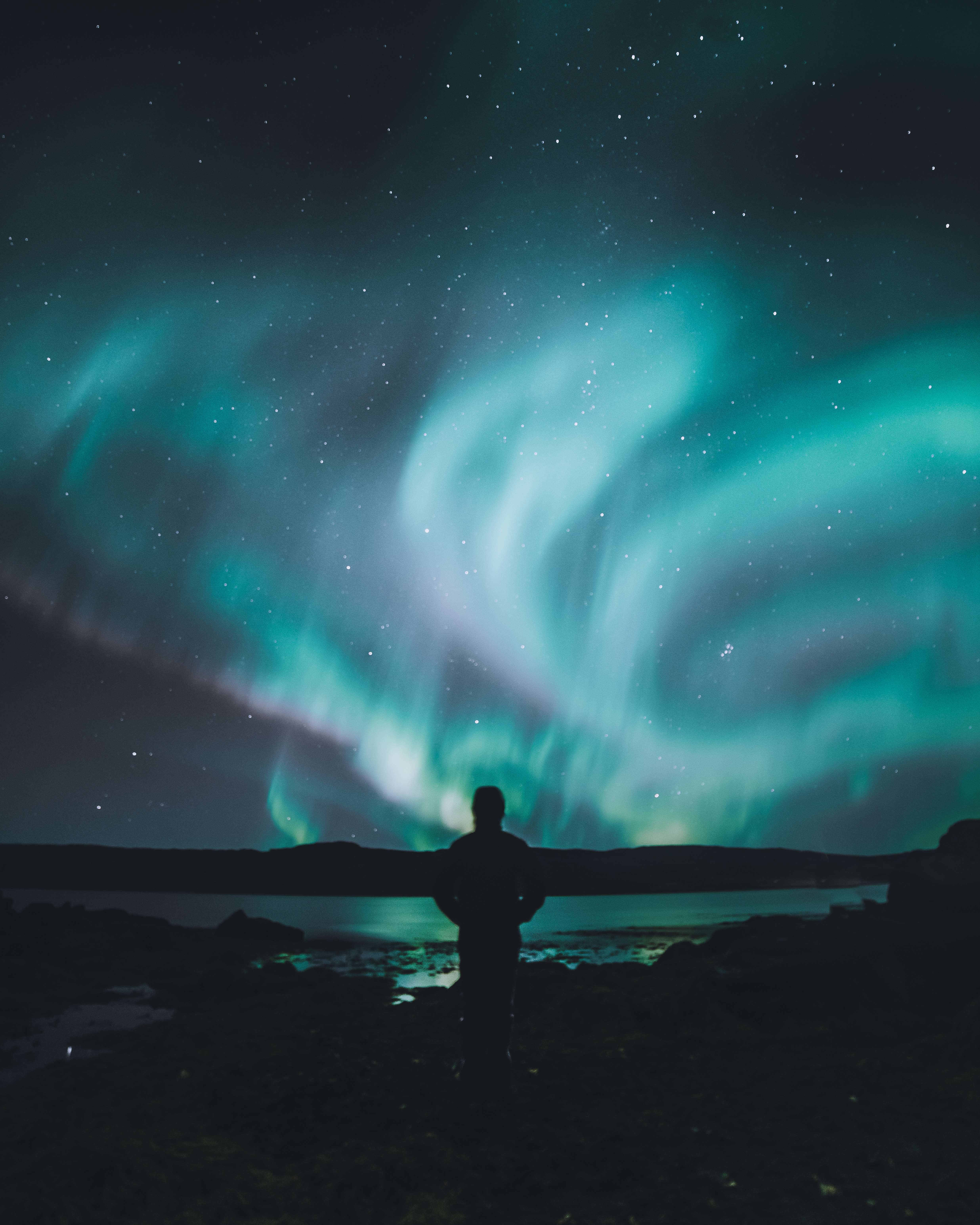 Download mobile wallpaper Aurora Borealis, Northern Lights, Shore, Bank, Person, Starry Sky, Human, Dark for free.