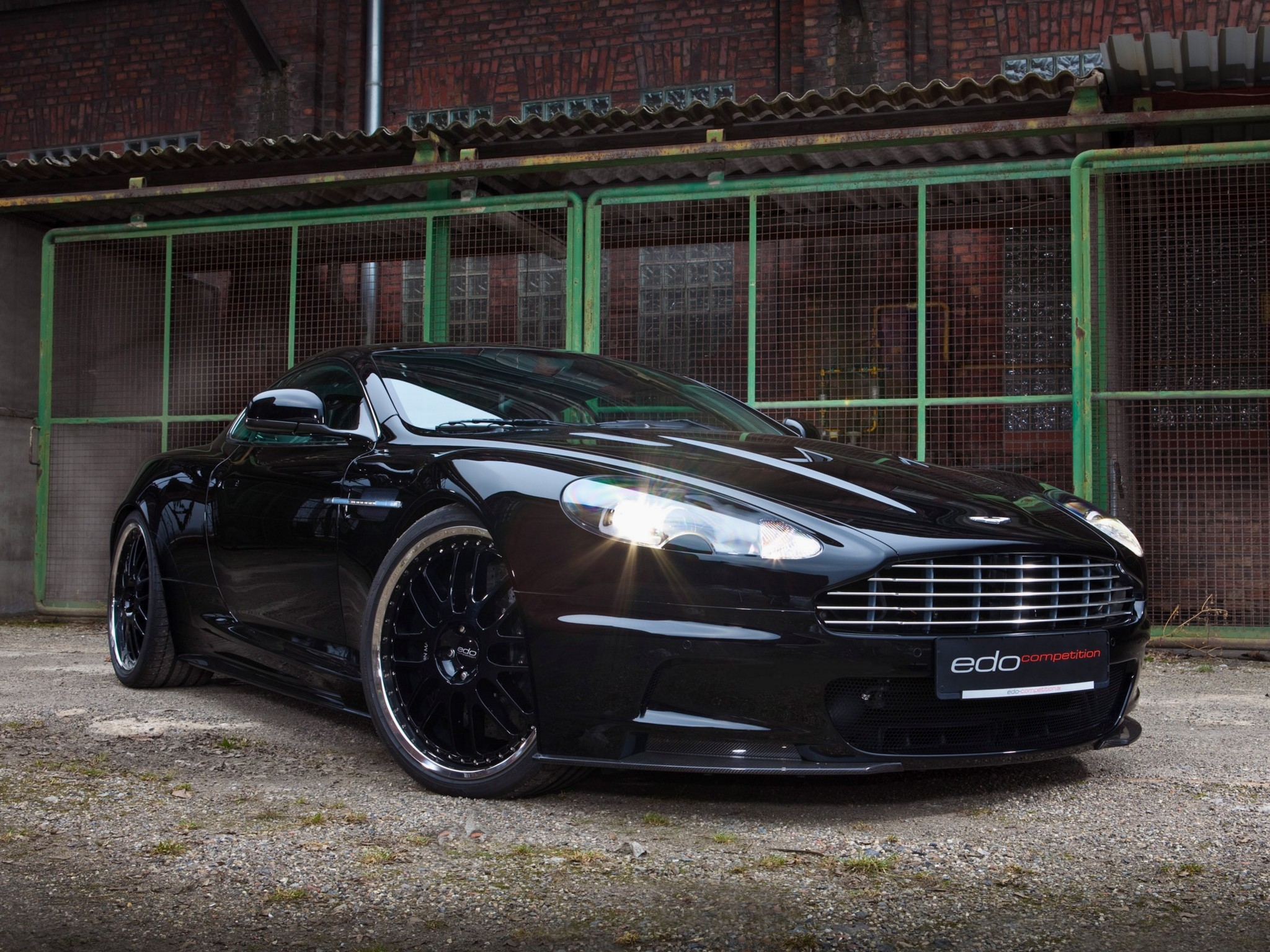 Mobile wallpaper dbs, cars, sports, aston martin, black, building, front view, 2010