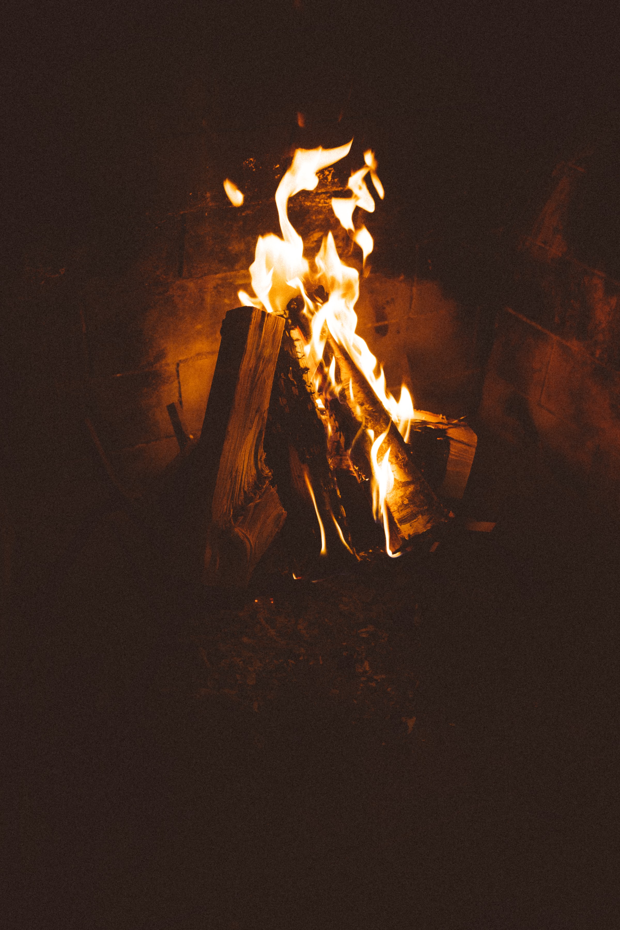 Download mobile wallpaper Flame, Fireplace, Fire, Firewood, Dark for free.