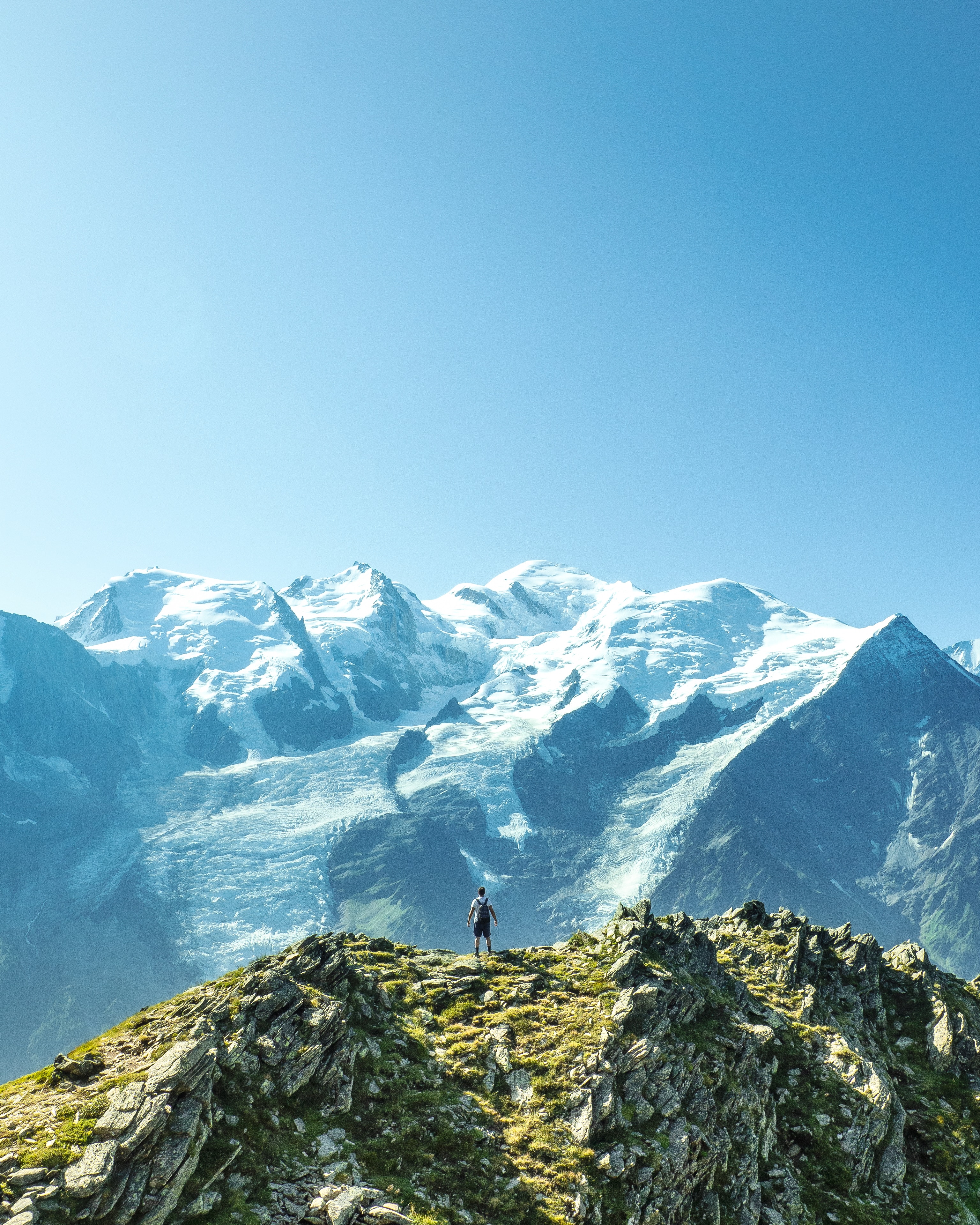 Download mobile wallpaper Vertex, Tops, Height, Person, Mountains, Nature, Human, Loneliness for free.