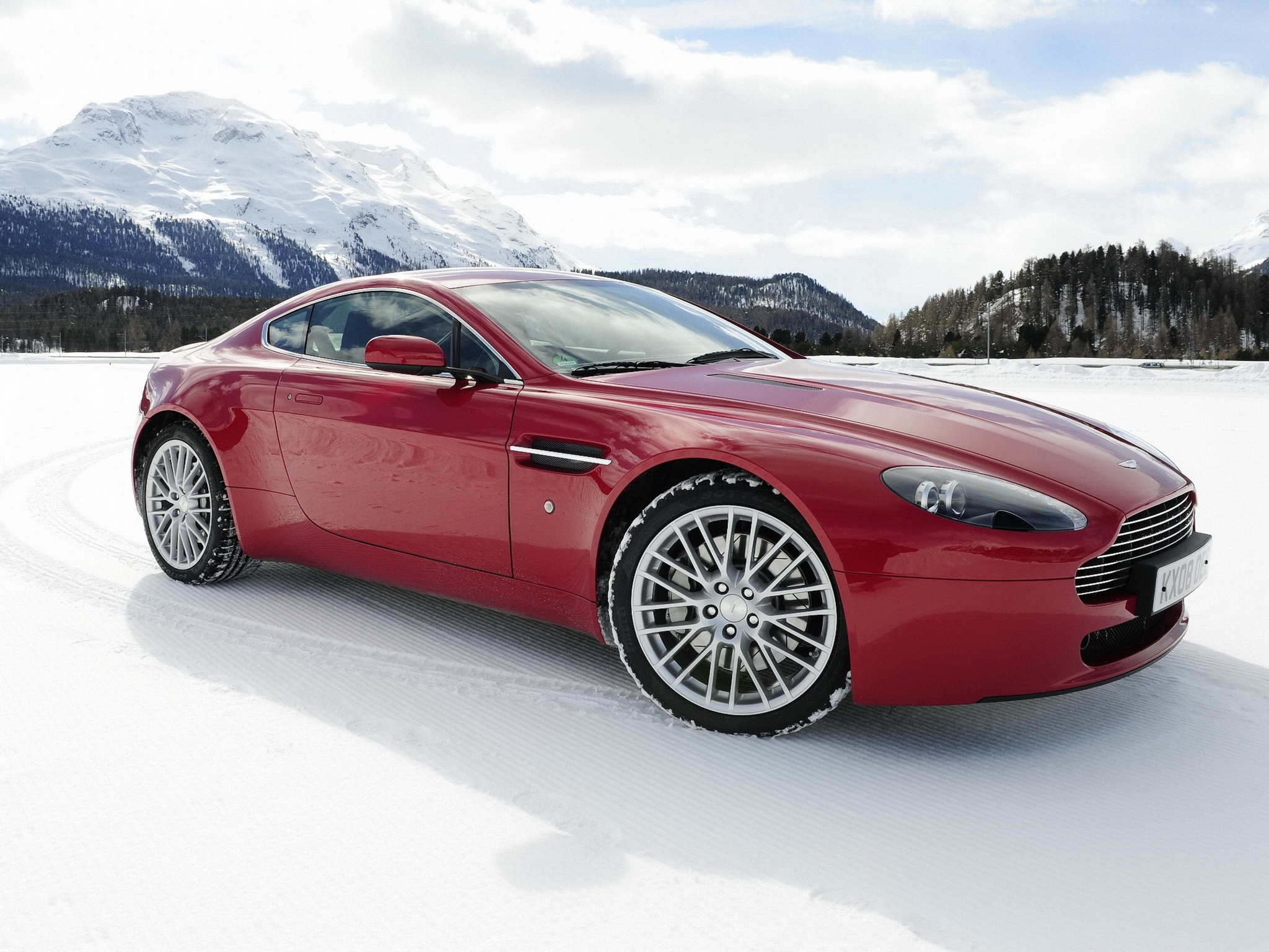 auto, mountains, snow, aston martin, cars, red, side view, 2008, v8, vantage wallpaper for mobile