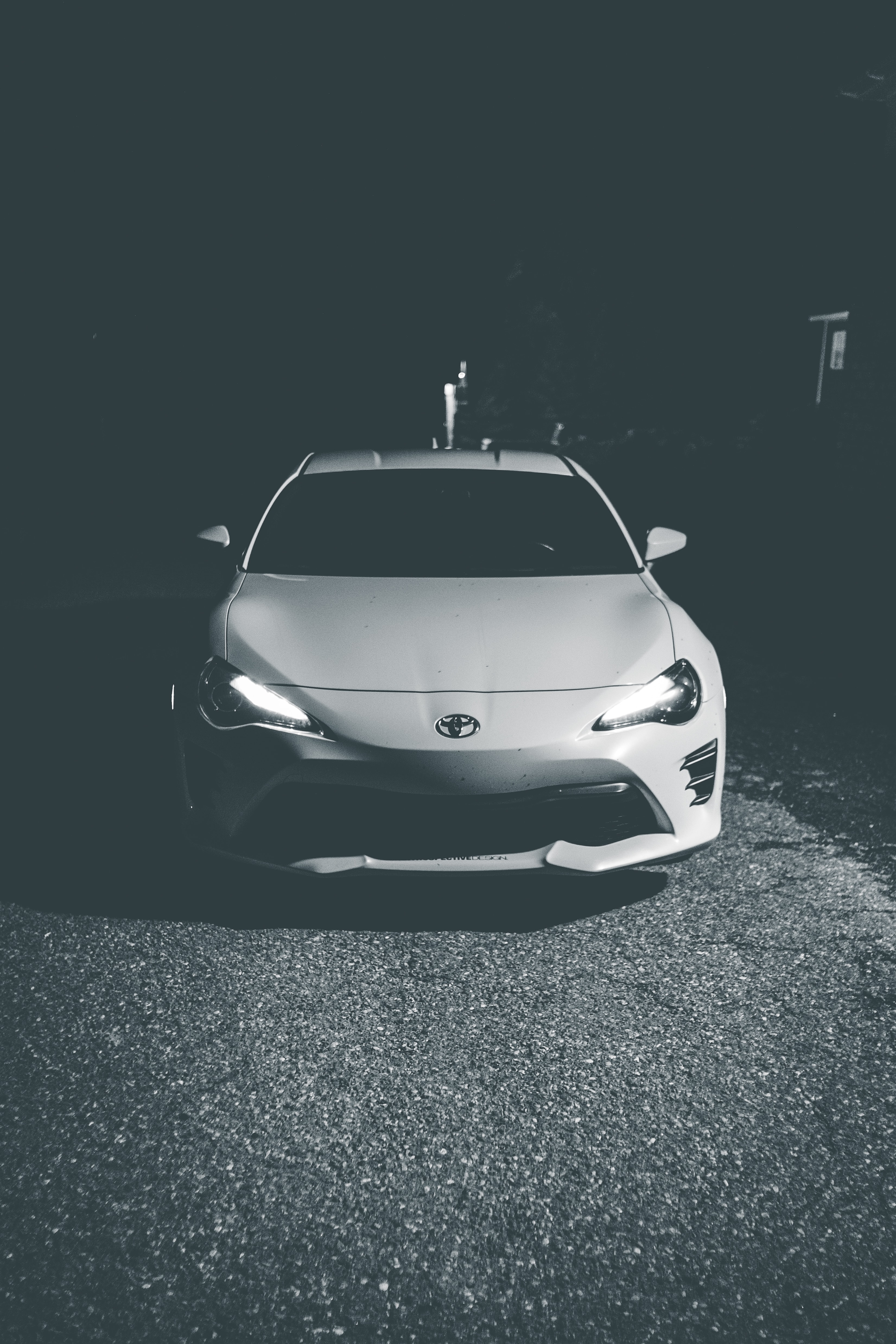 Download mobile wallpaper Lights, Chb, Bw, Machine, Car, Front View, Headlights, Toyota, Cars for free.