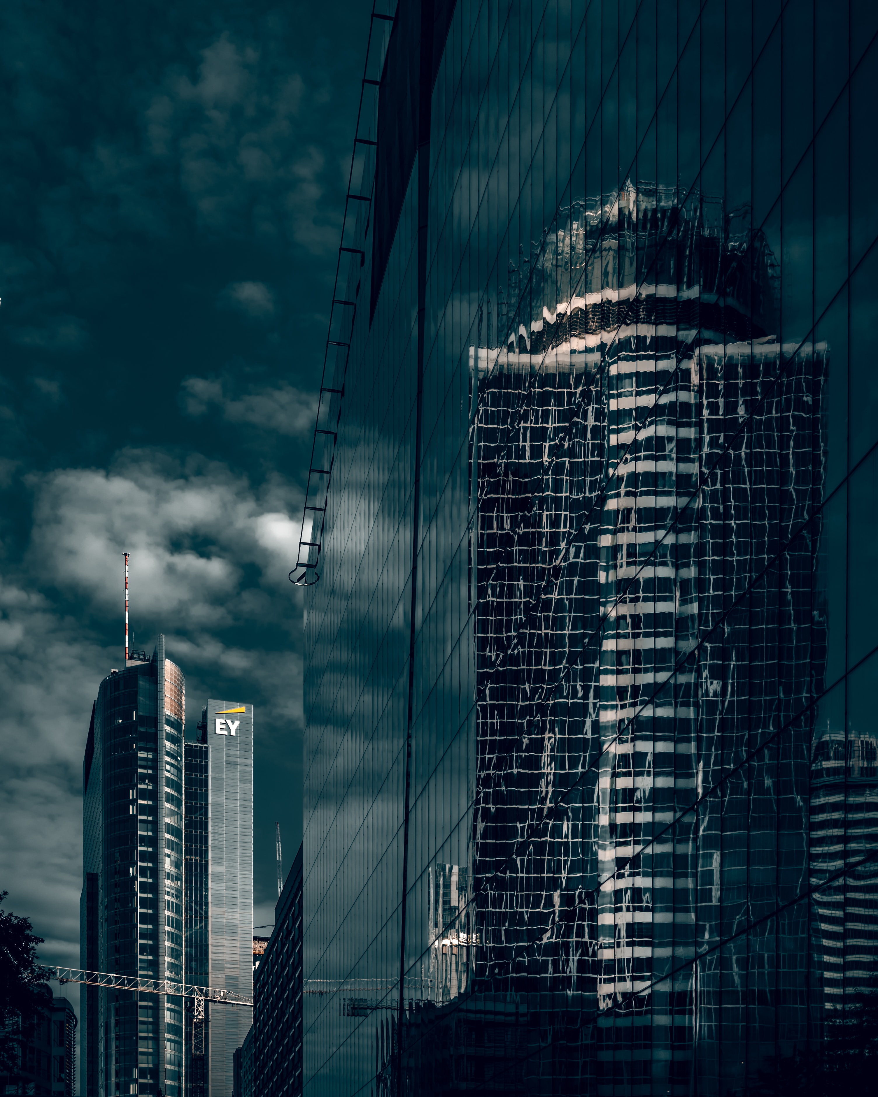 Download mobile wallpaper Skyscrapers, Building, Reflection, City, Cities for free.