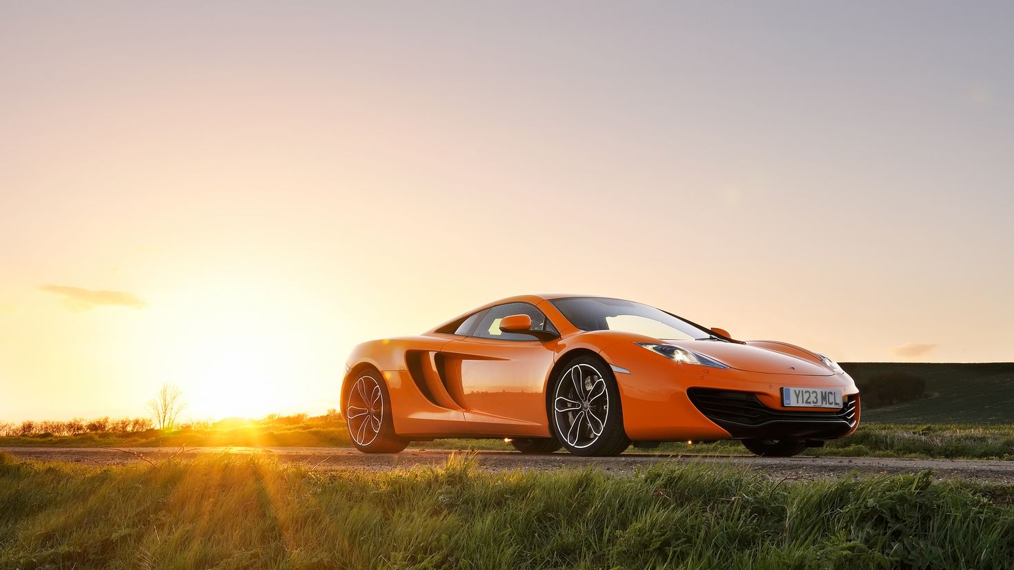 Высокого c. MCLAREN mp4 12c оранжевый. MCLAREN mp4-12c 4k. MCLAREN 540 оранжевый. Макларен мк2 оранжевая 1980х1080.