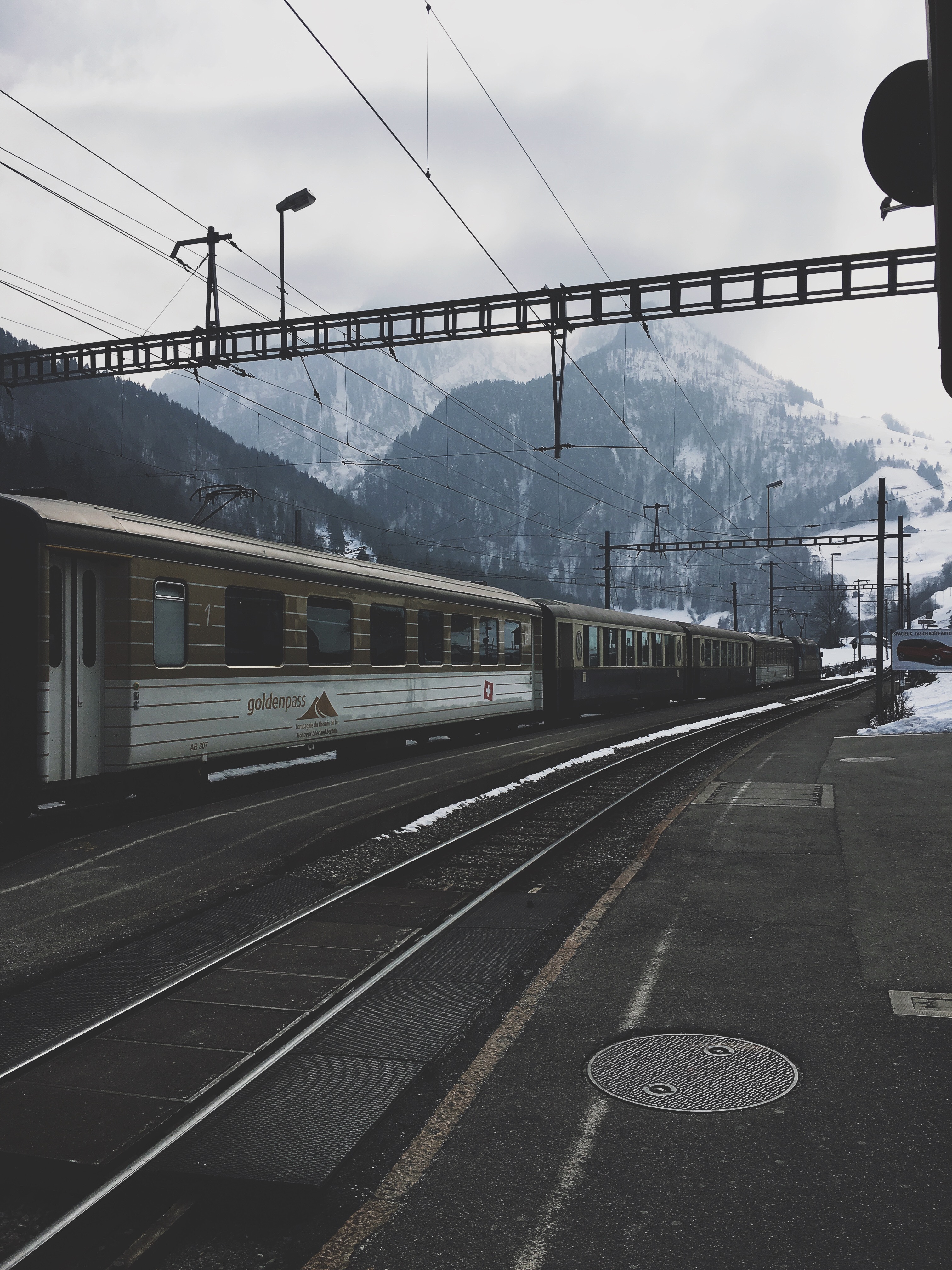 115576 скачать картинку поезд, железная дорога, зима, горы, разное - обои и заставки бесплатно