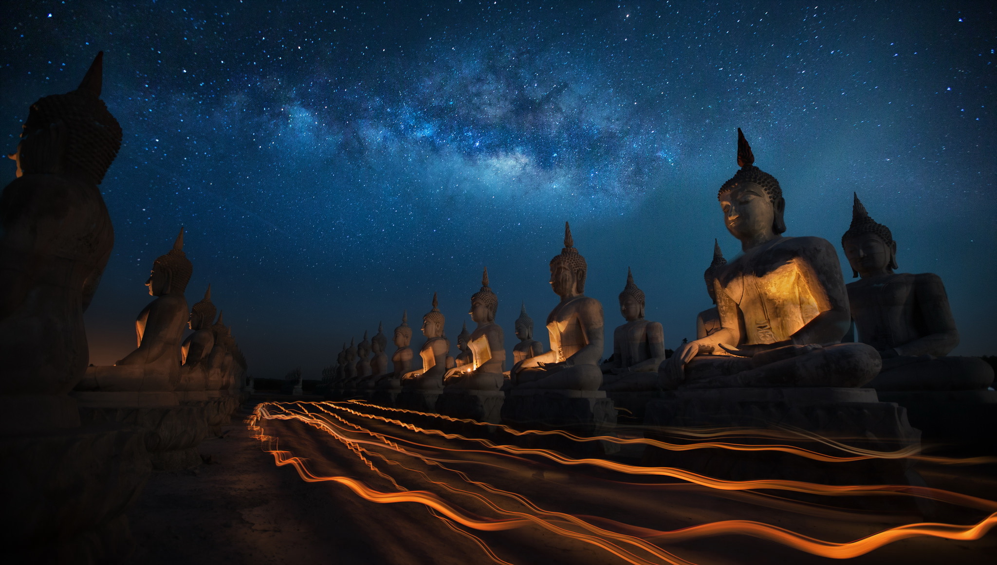 Mobile wallpaper buddha, statue, milky way, thailand, religious, night, starry sky, time lapse