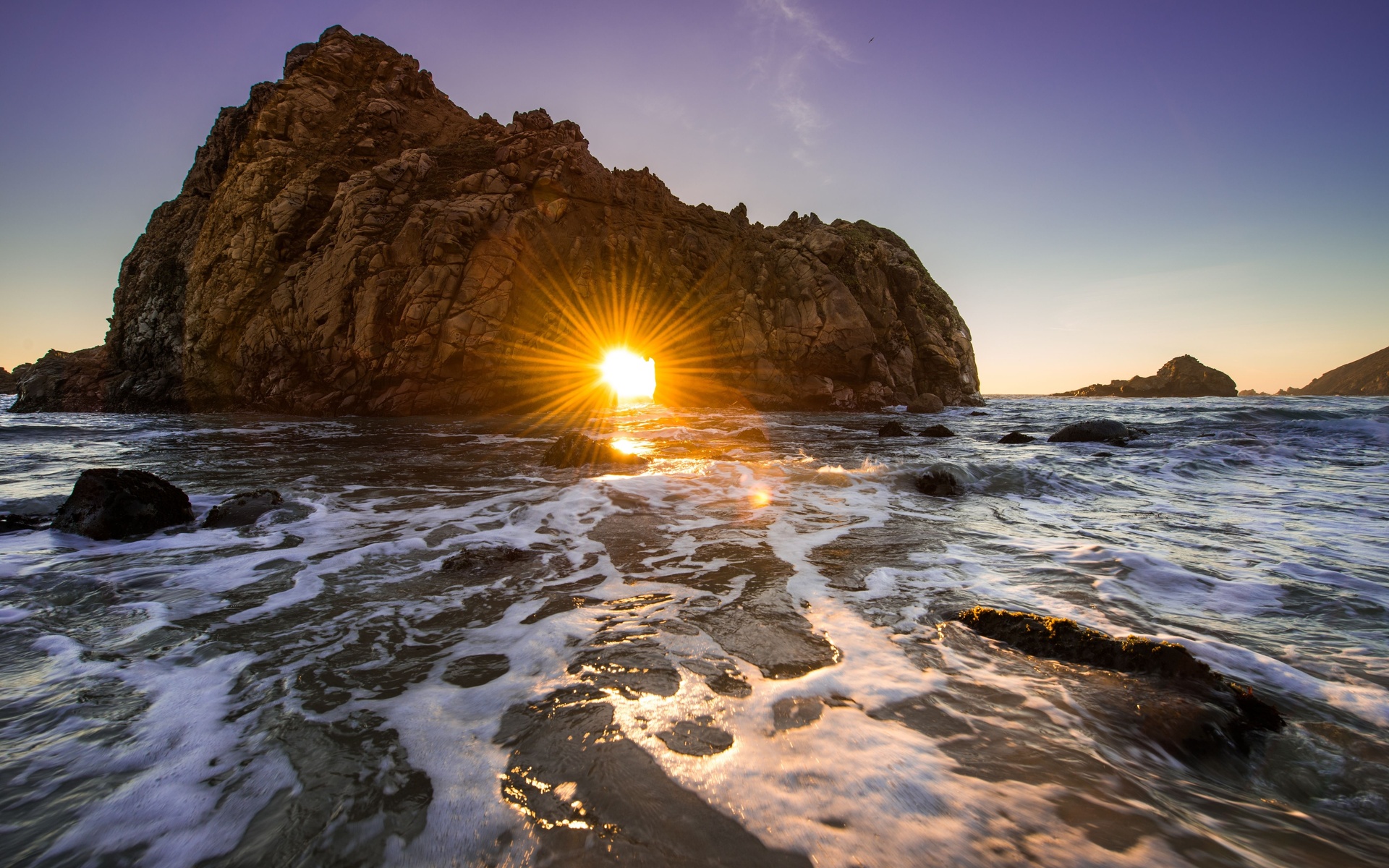 Download mobile wallpaper Sunset, Ocean, Earth, Arch, California, Sunbeam for free.