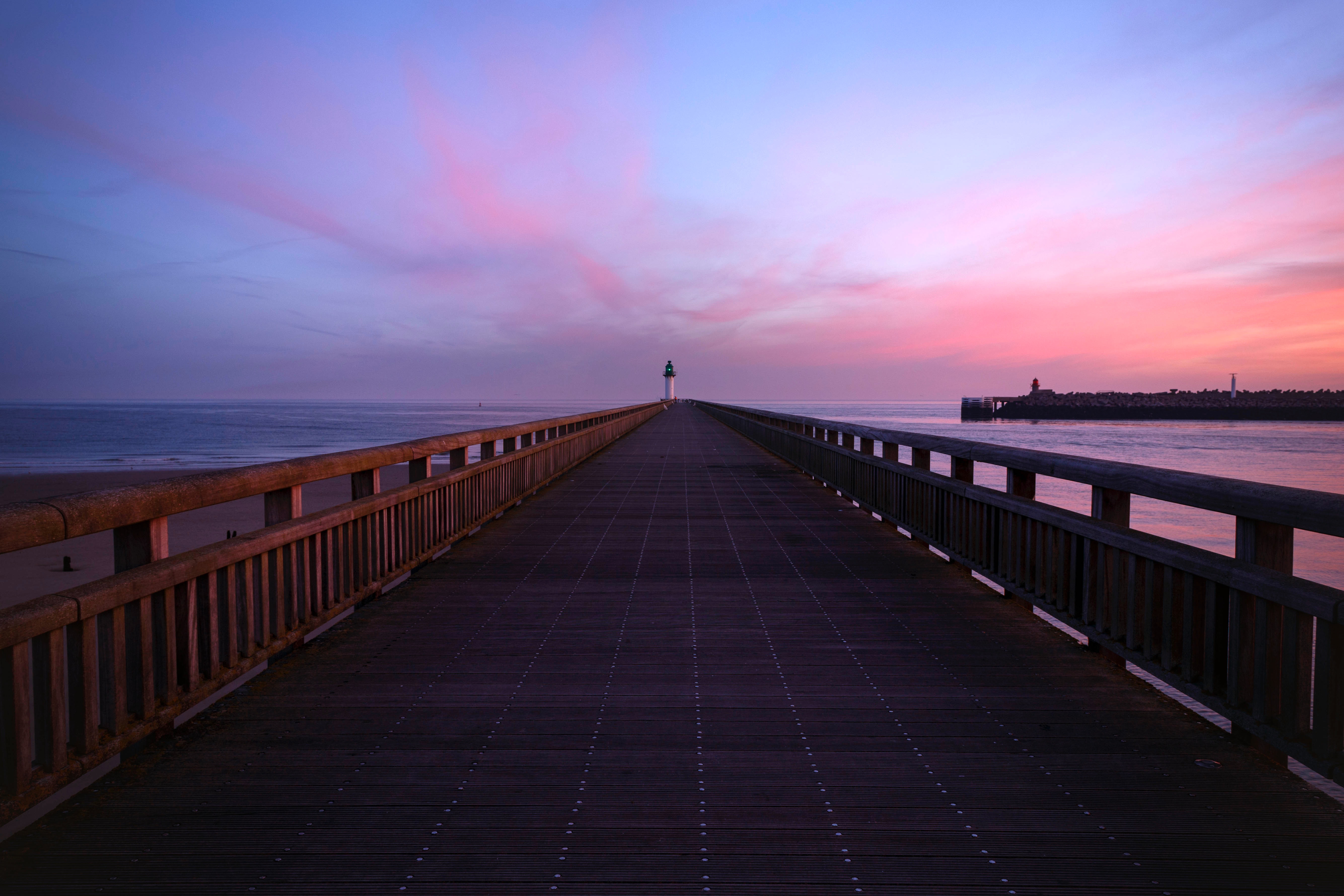 Download mobile wallpaper Pier, Sky, Horizon, Nature, Lighthouse, Sea, Dawn for free.