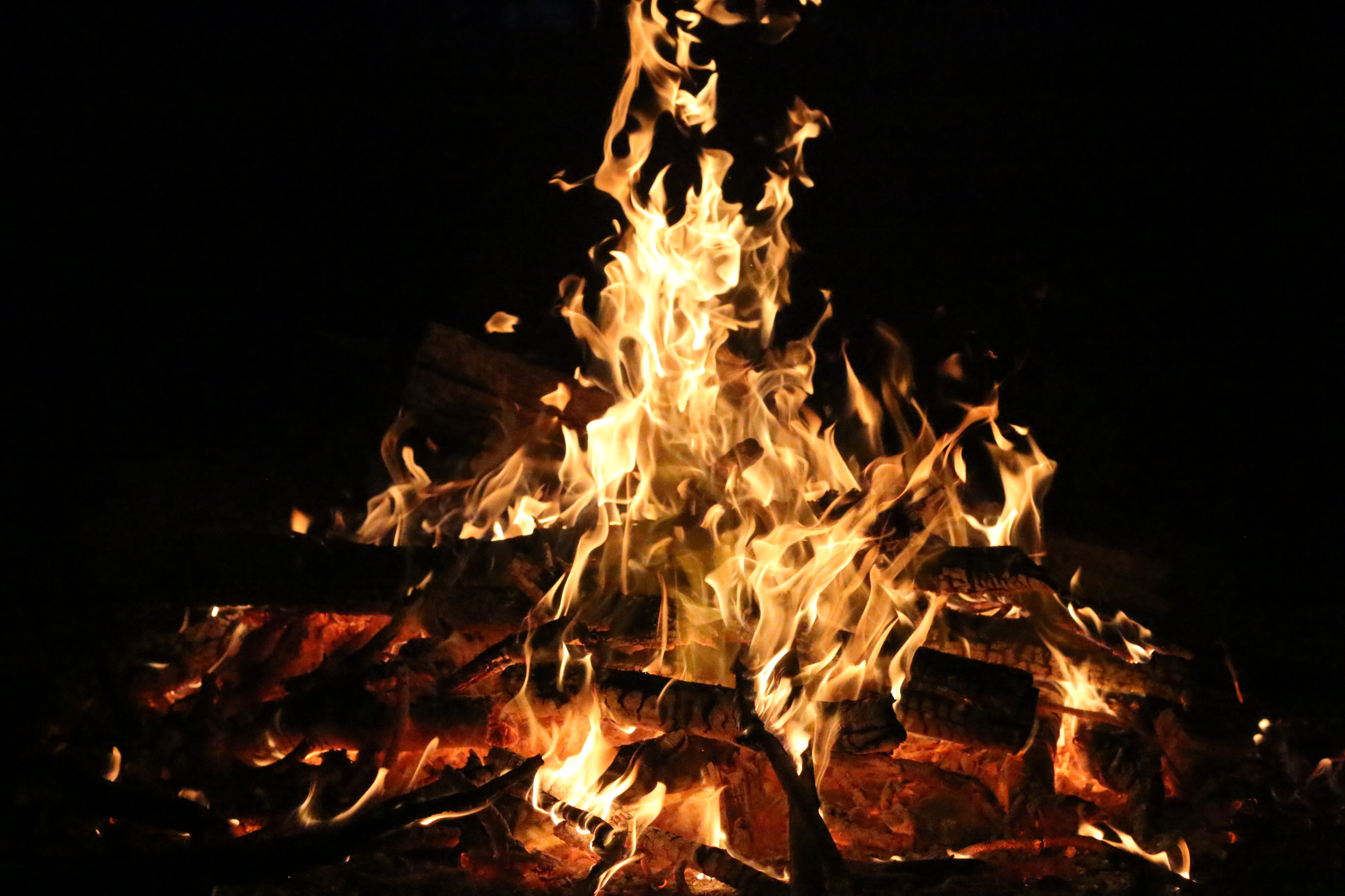 Download mobile wallpaper Coals, Flame, Bonfire, Firewood, Fire, Dark for free.