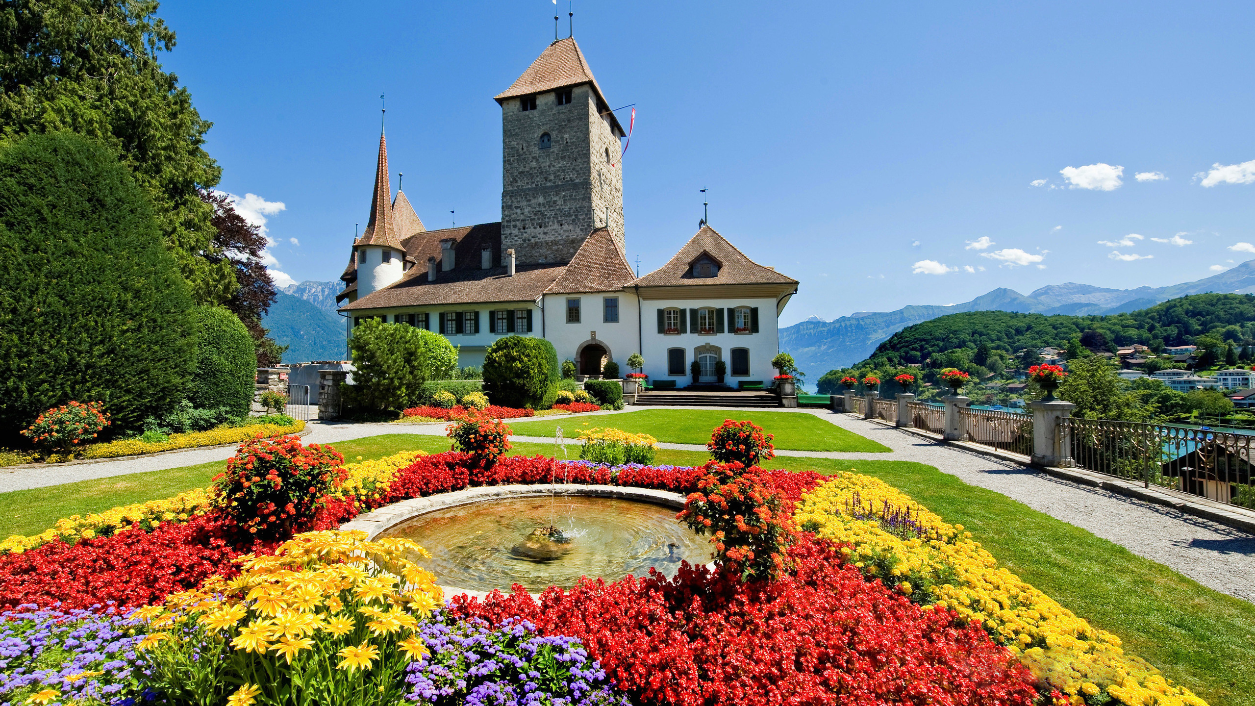 375131 скачать картинку фонтан, замки, швейцария, сад, сделано человеком, замок, здание, цветок - обои и заставки бесплатно