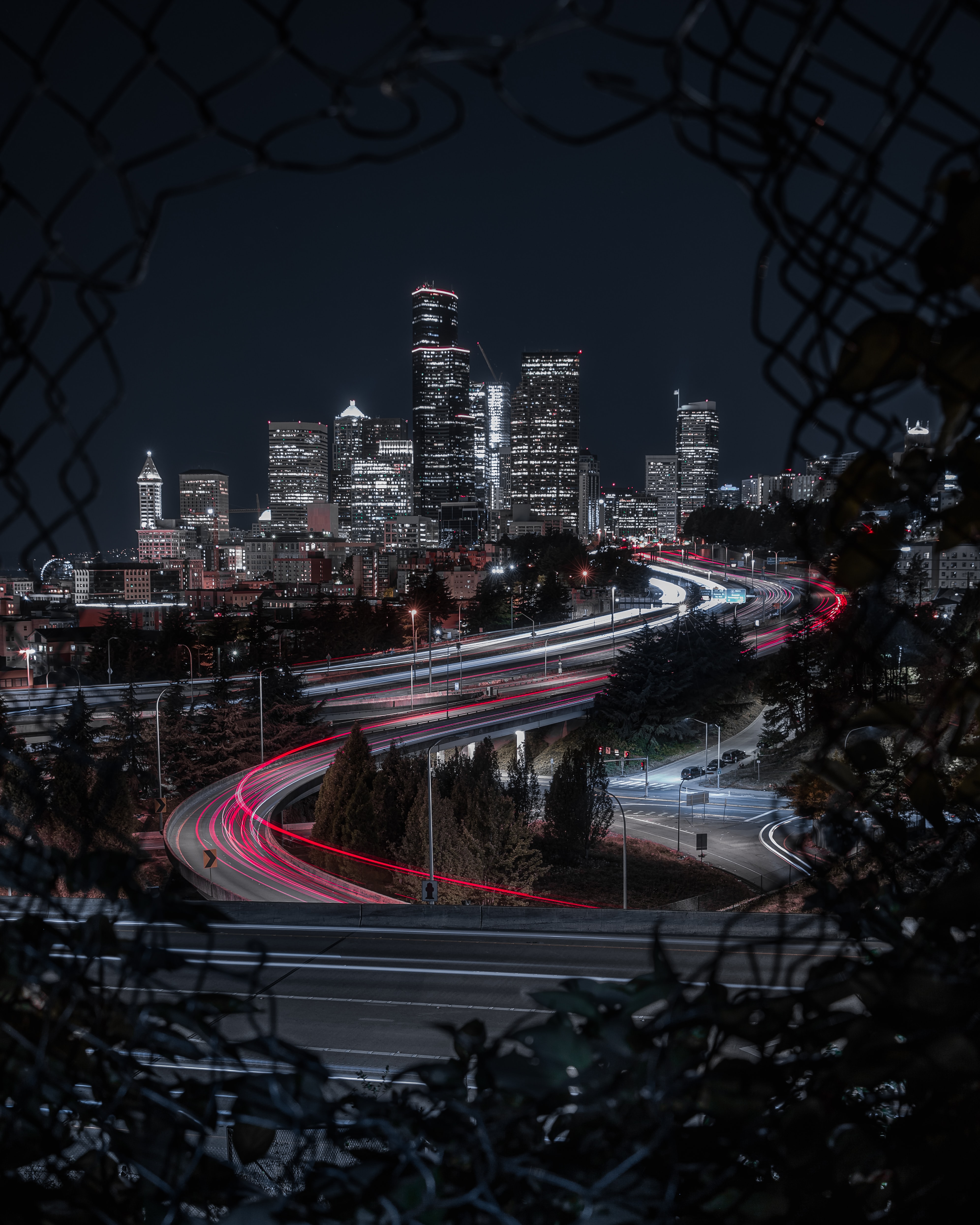 Download mobile wallpaper Cities, Long Exposure, Lights, Night City, Building, Roads for free.