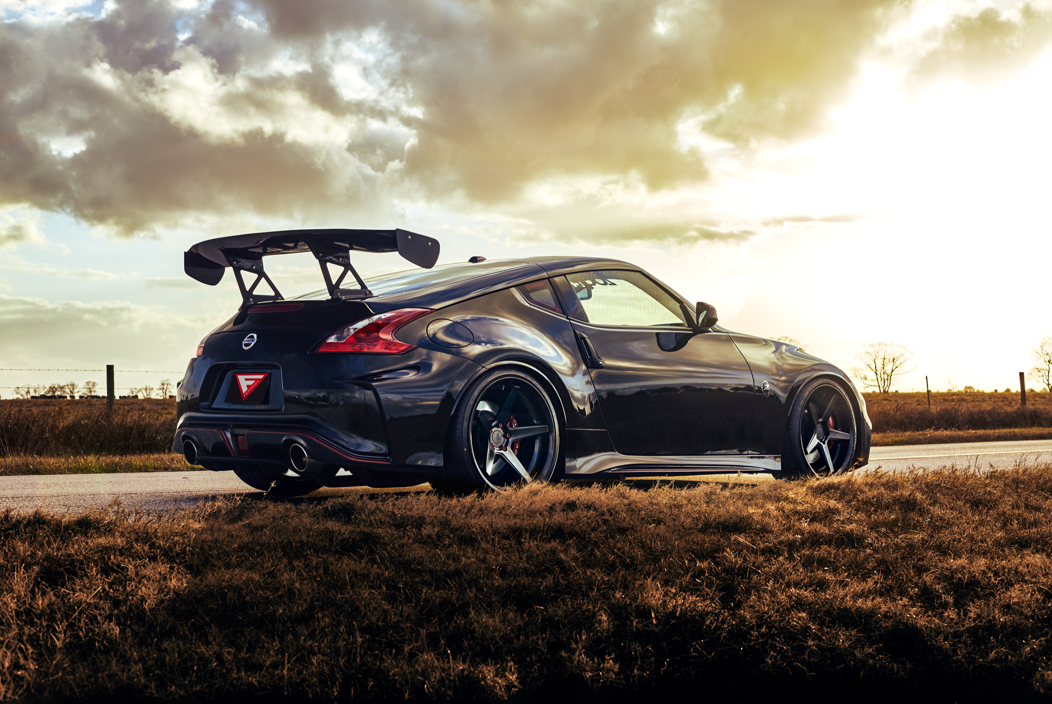 Download wallpaper 938x1668 nissan 370z, nissan, car, black, fog iphone  8/7/6s/6 for parallax hd background