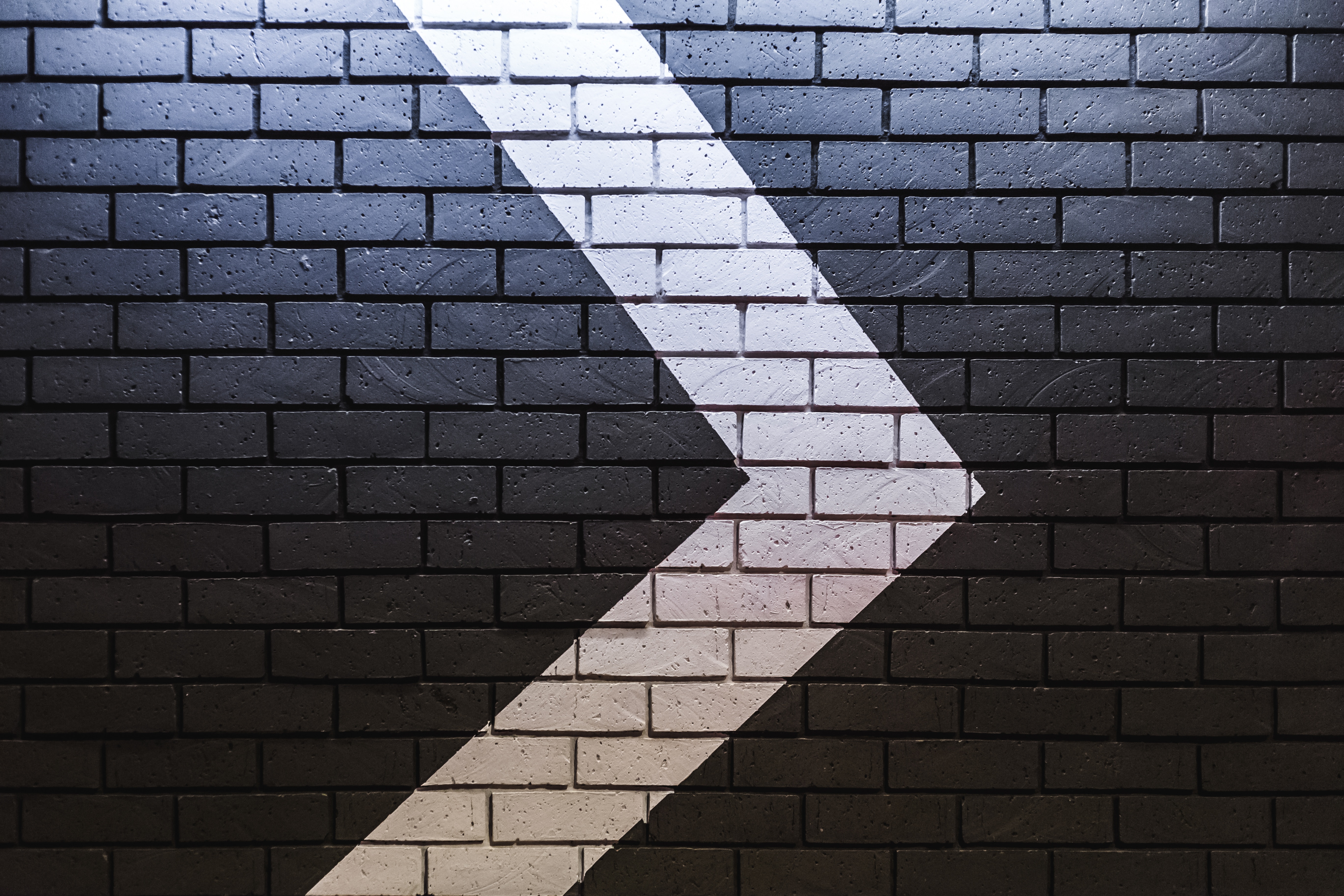 Download mobile wallpaper Arrow, Wall, Textures, Texture, Brick for free.