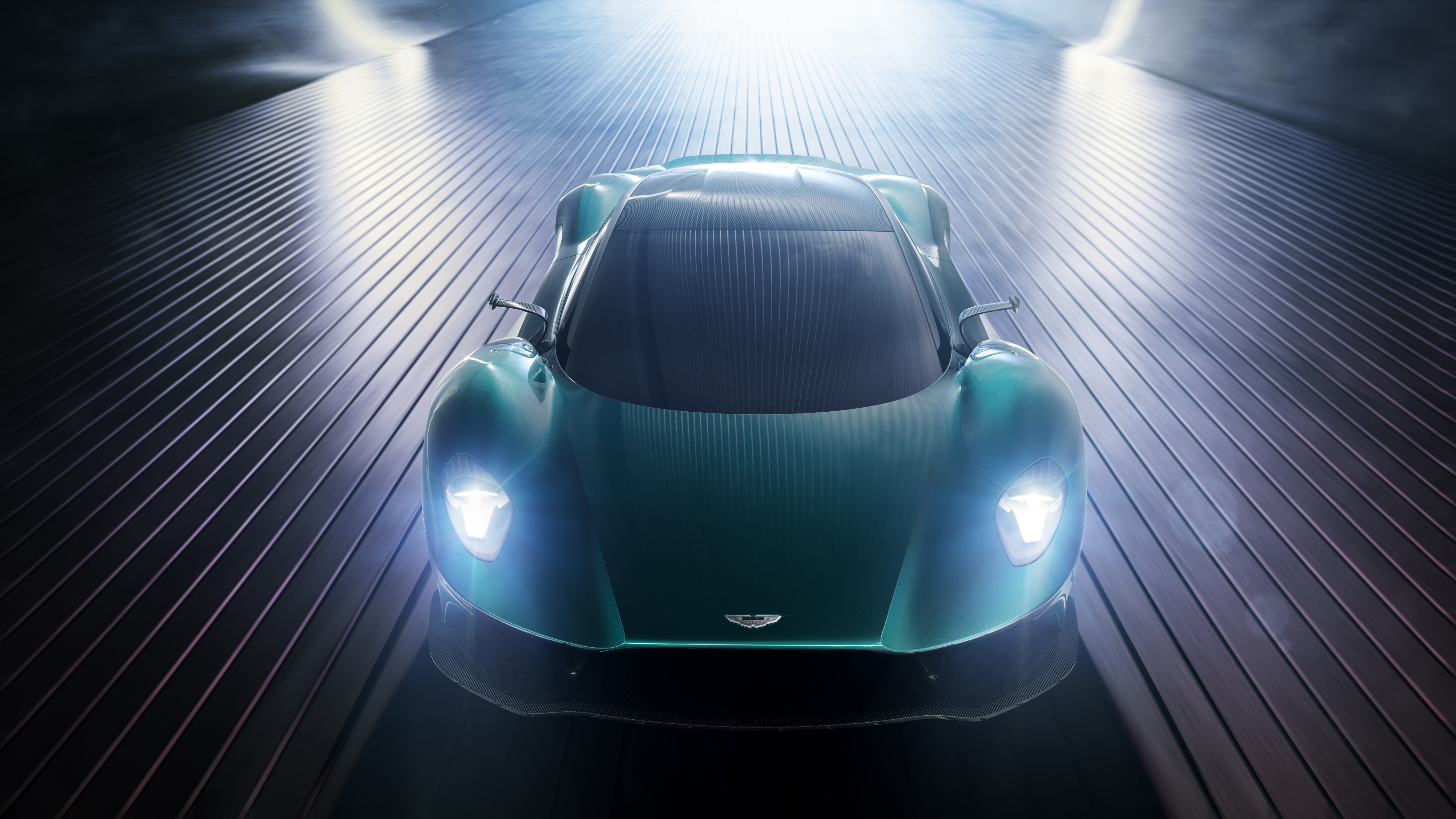 Зеленый свет машина. Aston Martin Vanquish Vision Concept. Aston Martin Vision. Спорткар Aston Martin зеленый.