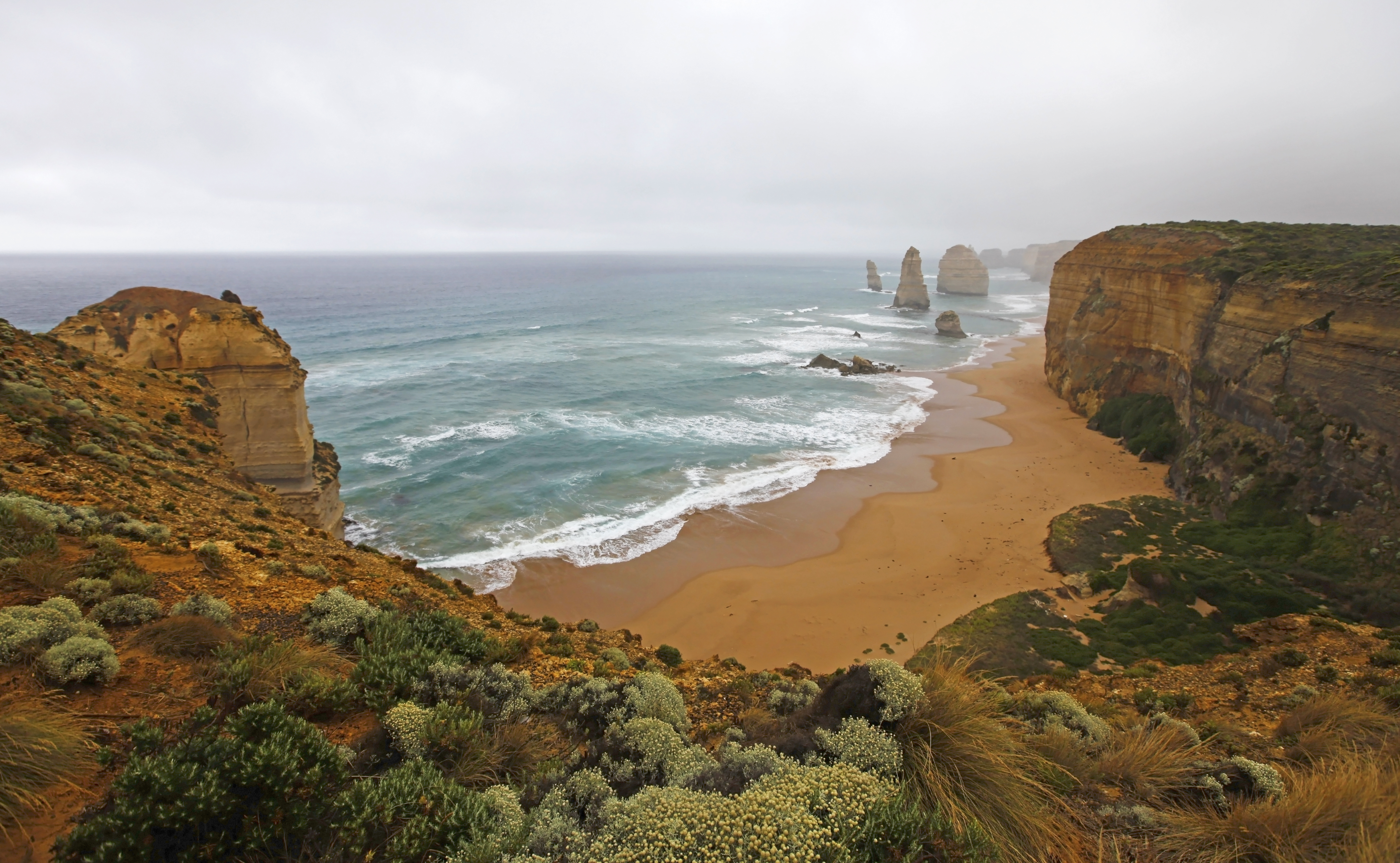 australia, earth, the twelve apostles, coastline, fog, limestone stacks, ocean, sand, sea, victoria (australia), wave Phone Background