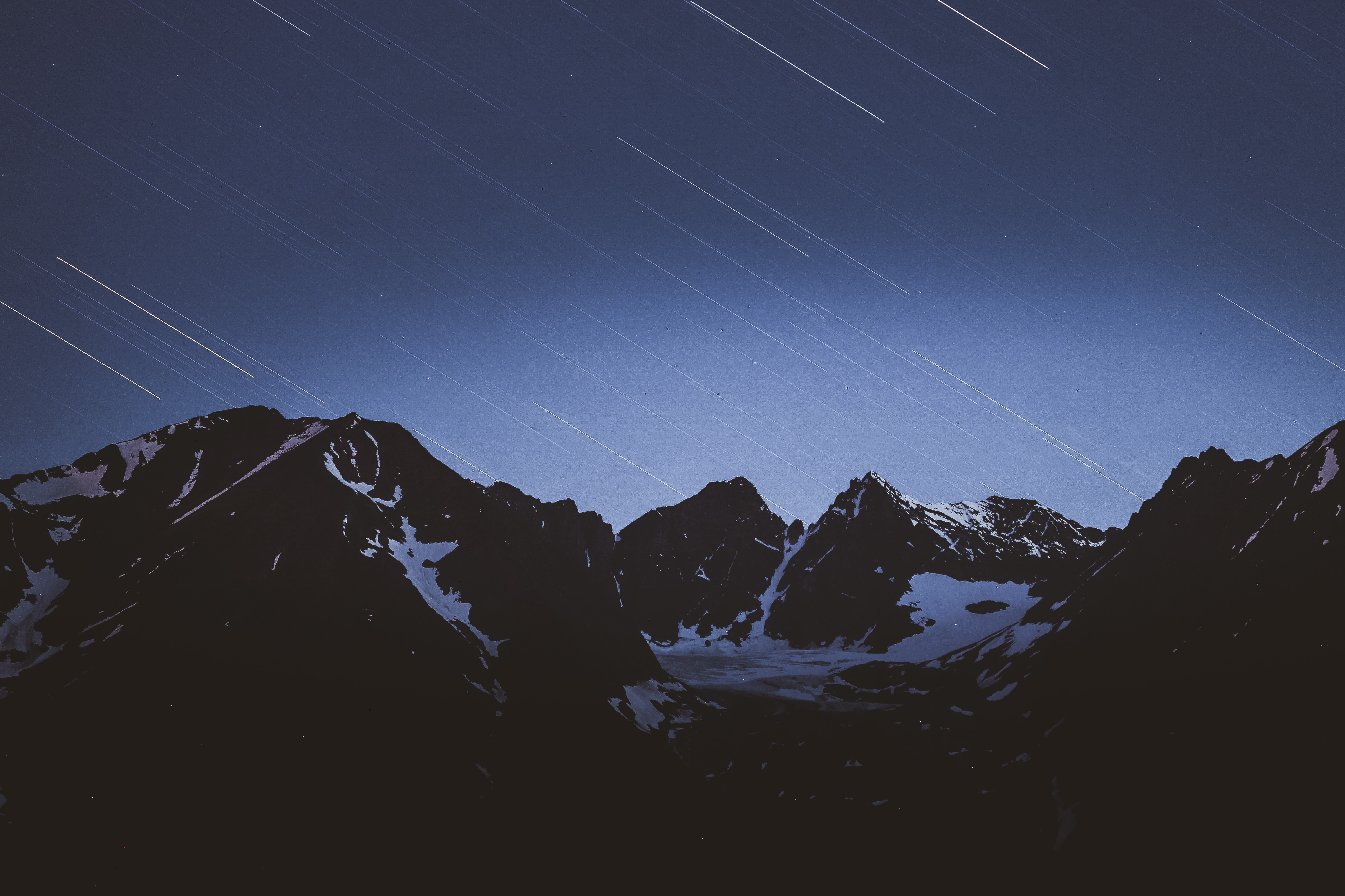 105709 скачать обои горы, звездопад, природа, звезды, снег, заснеженный - заставки и картинки бесплатно