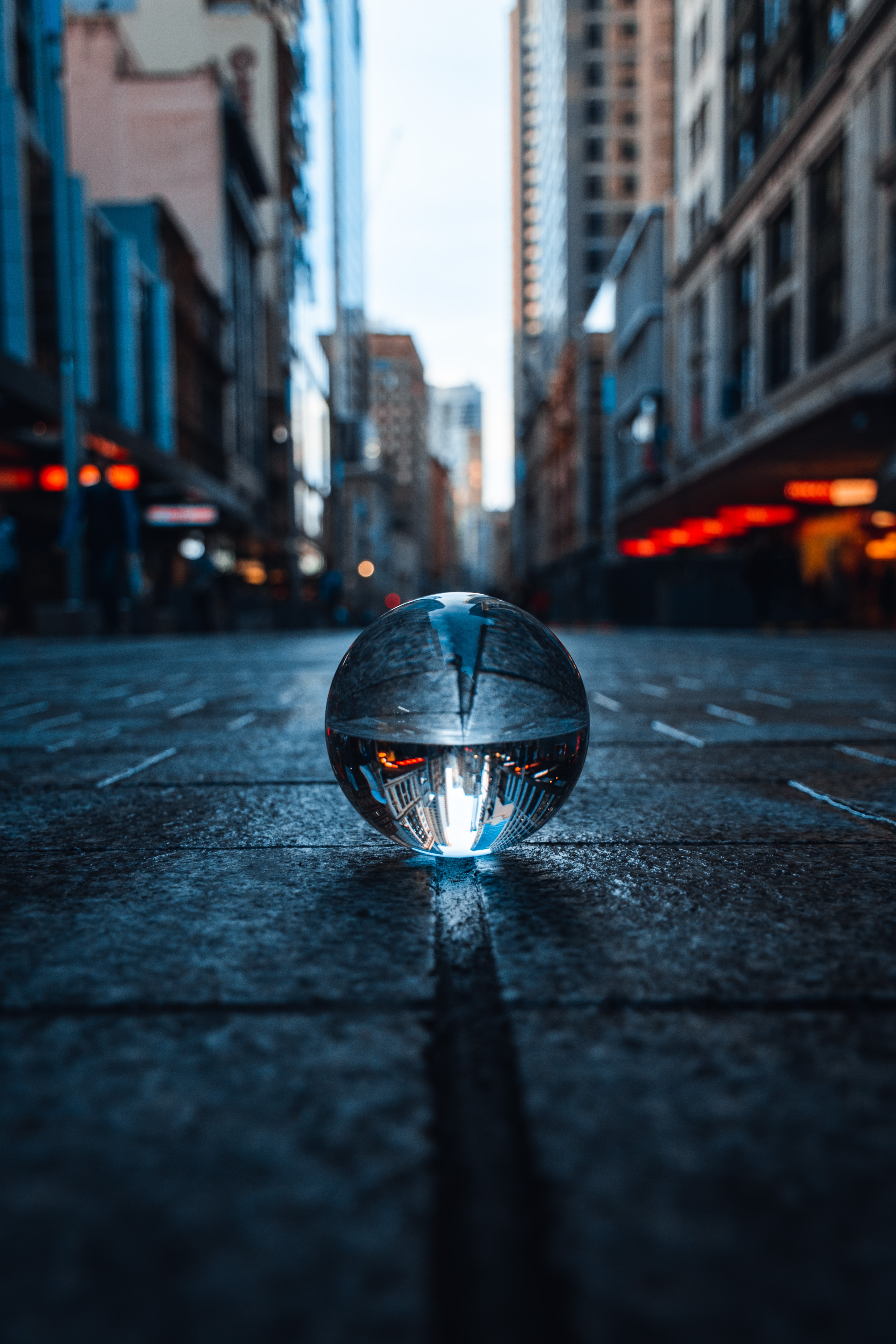 reflection, crystal ball, miscellanea, miscellaneous, city, ball, sphere cell phone wallpapers