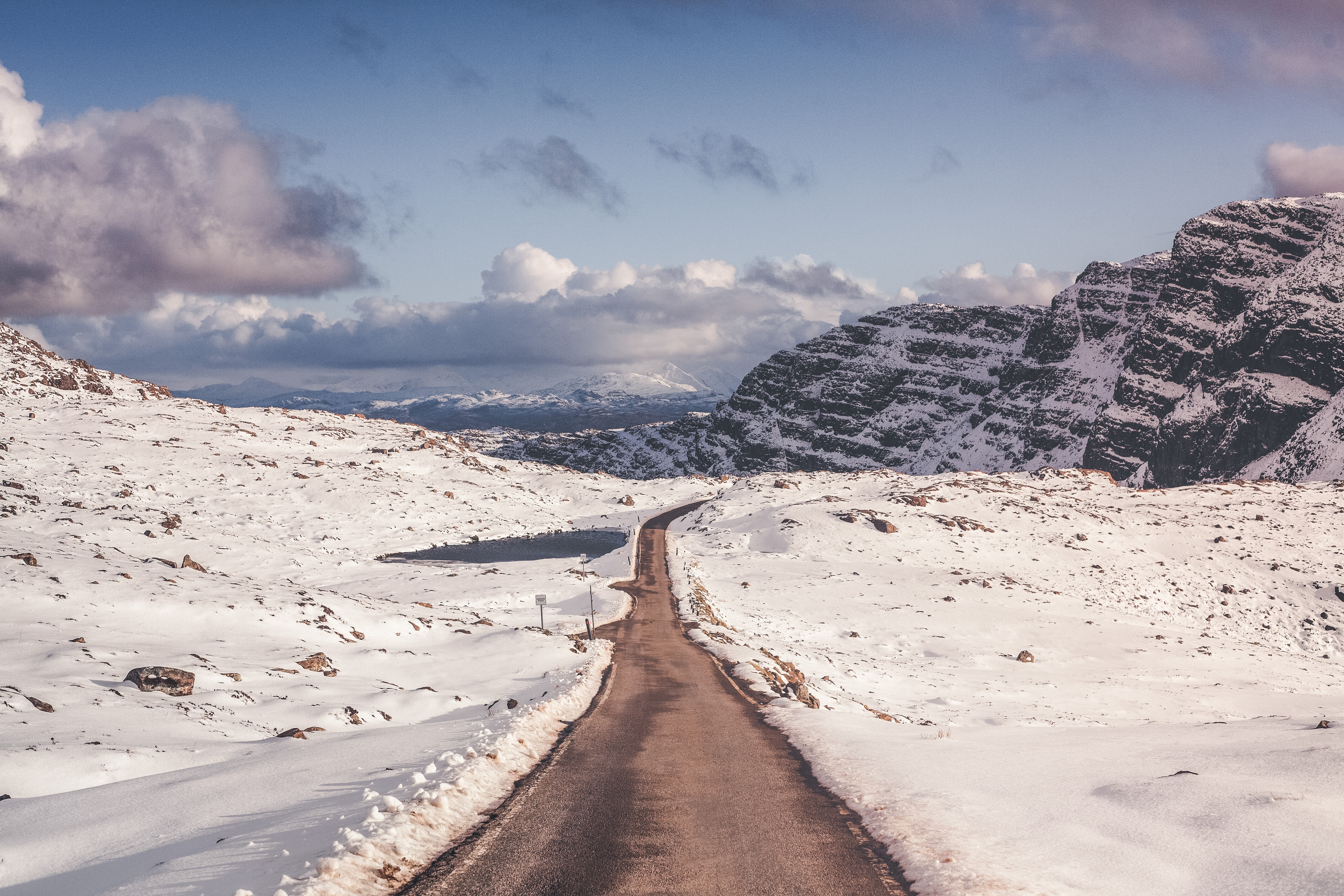 Free download wallpaper Nature, Turn, Snow, Mountains, Road on your PC desktop